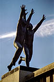 Oslo, Norway. Vigeland Park. Sculptures of the bridge, Two boys running with arms towards the sky.